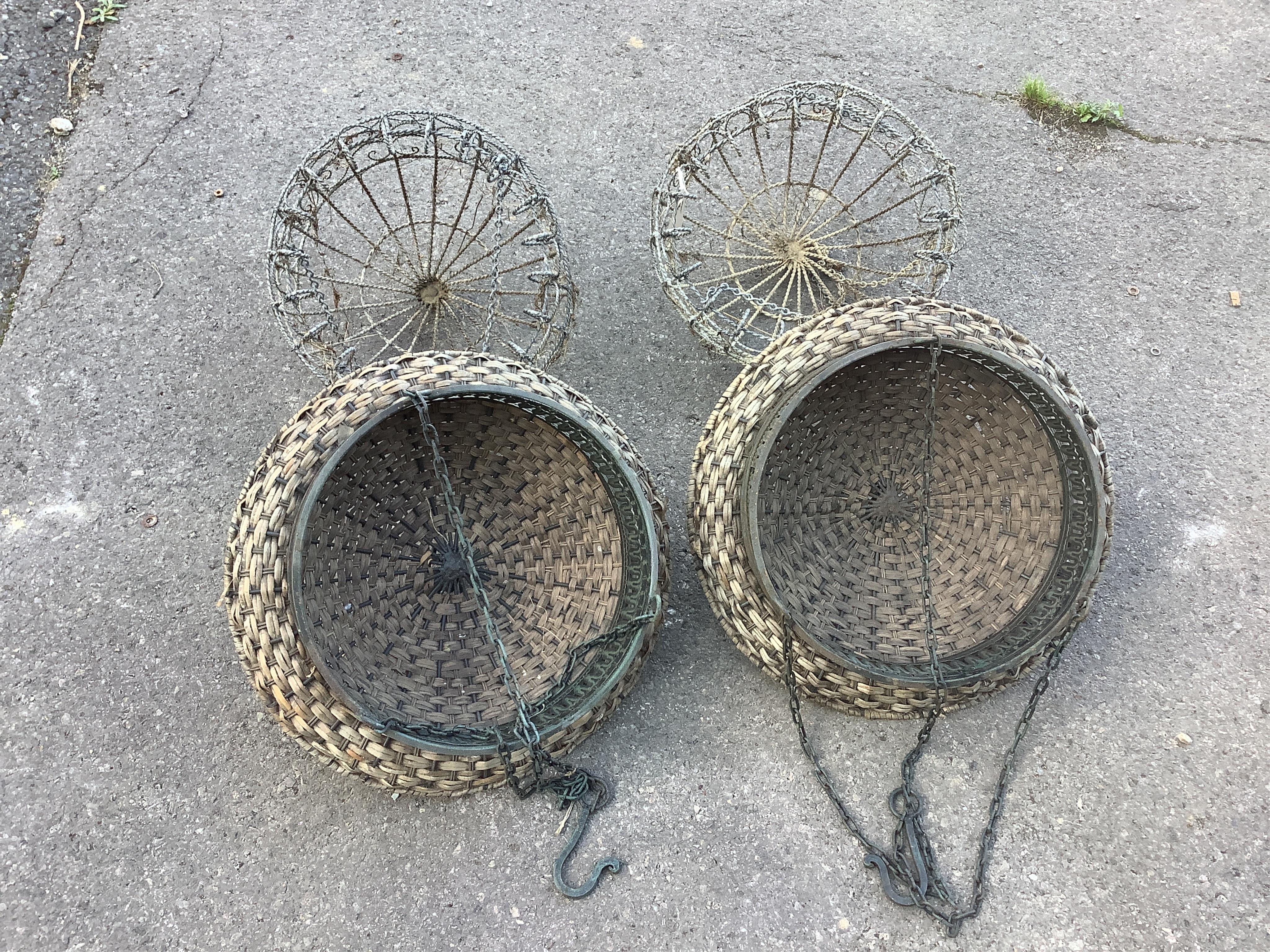 Four various hanging baskets, largest diameter 47cm. Condition - fair